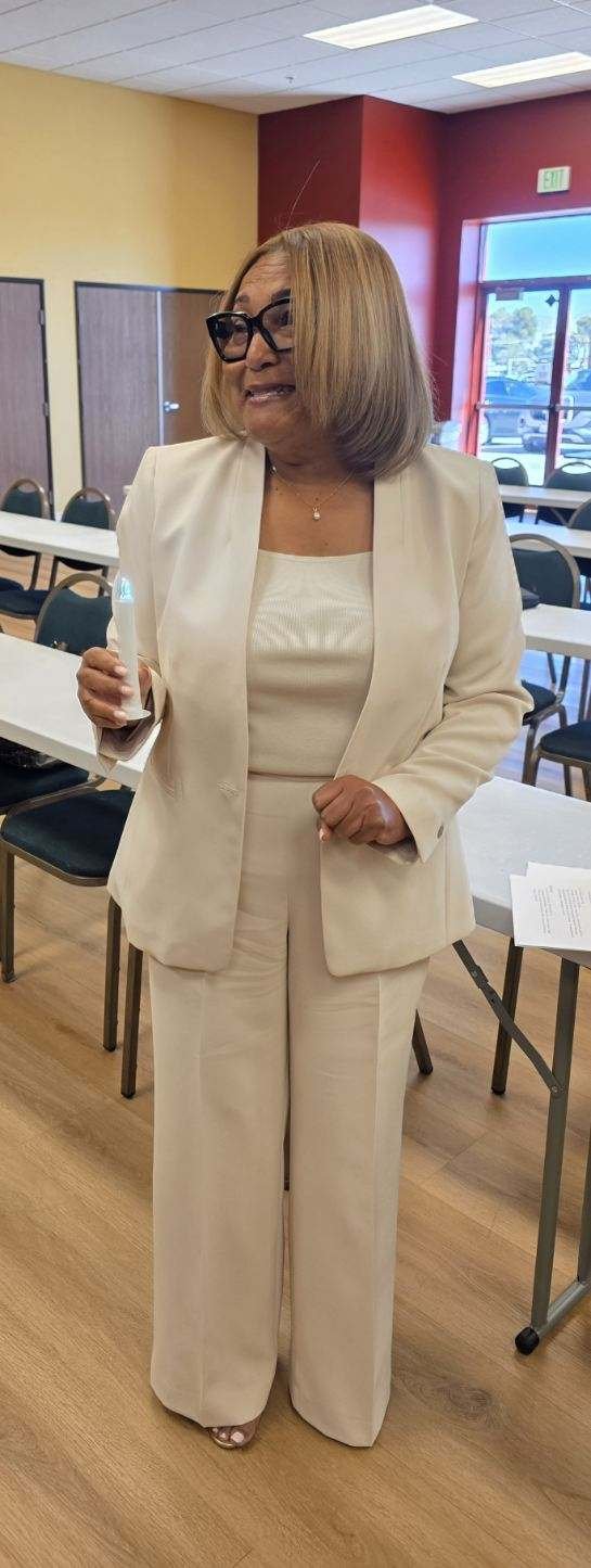 Event officiant holding a candle