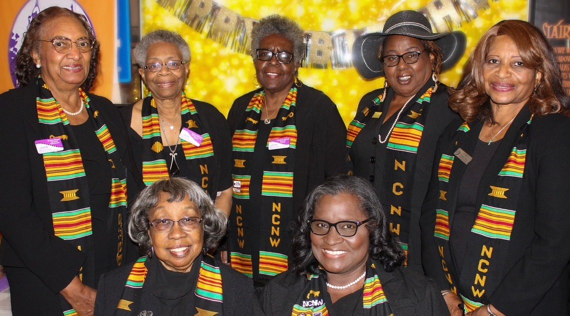 NCNW HDS members wearing kente stoles